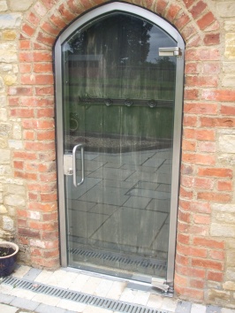 Arched-top single action GL15 in stainless steel rebate frame