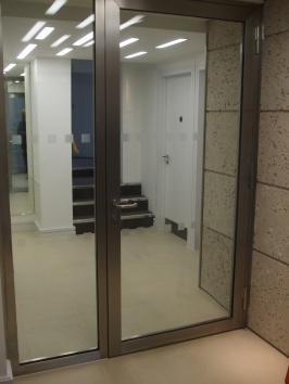 Brushed stainless steel asymmetric double door