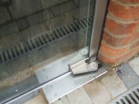 Dorma floor spring, below access cover Dorma floor spring, below access cover